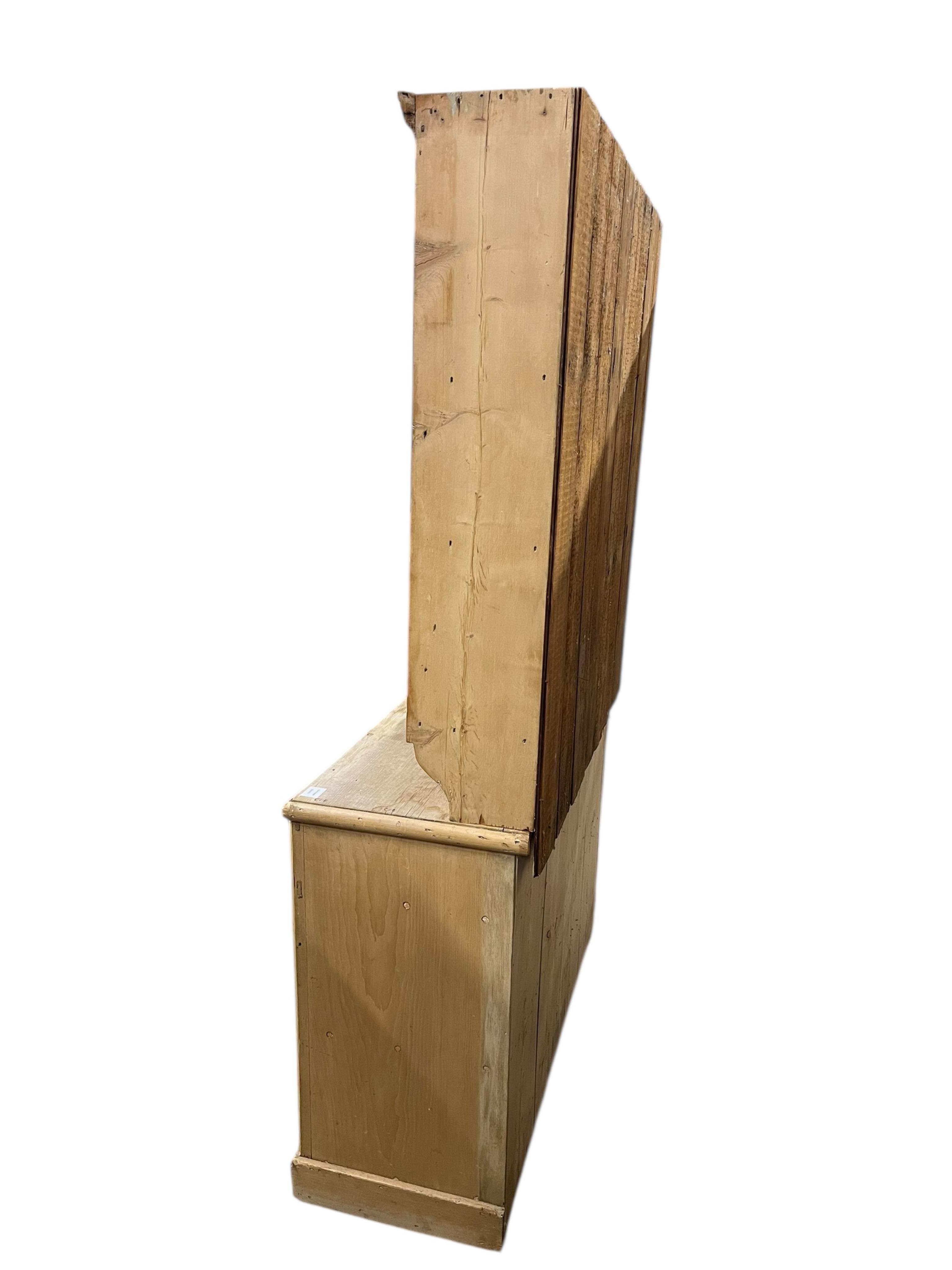 A Victorian pine dresser with glazed upper section, width 110cm, depth 43cm, height 190cm